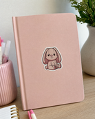 Bubbles the Bunny sticker on a notebook
