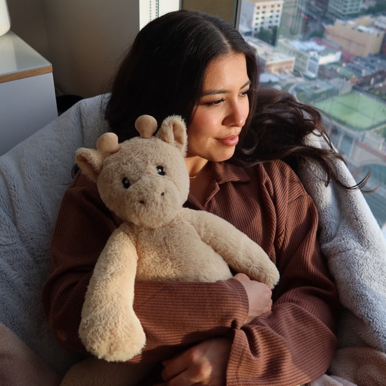 A Cuddle Club customer with their Cuddle Pal
