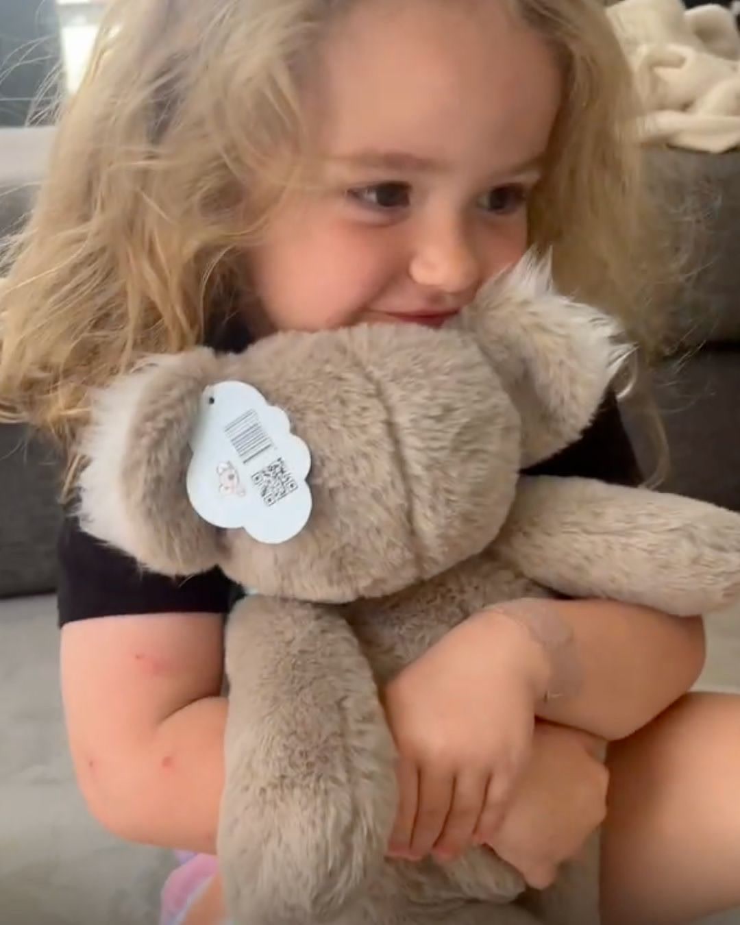 A Cuddle Club customer with their Cuddle Pal