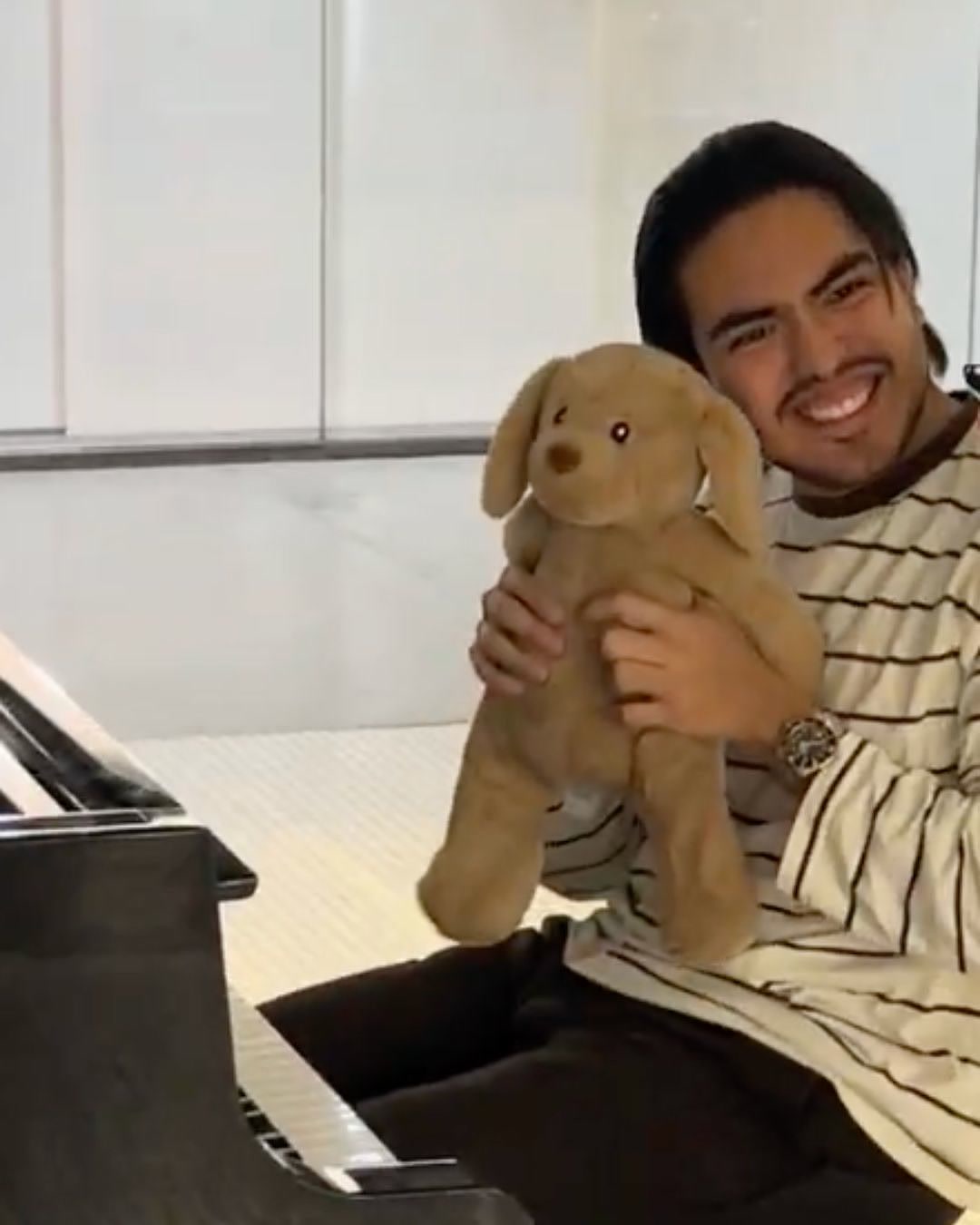 A Cuddle Club customer with their Cuddle Pal
