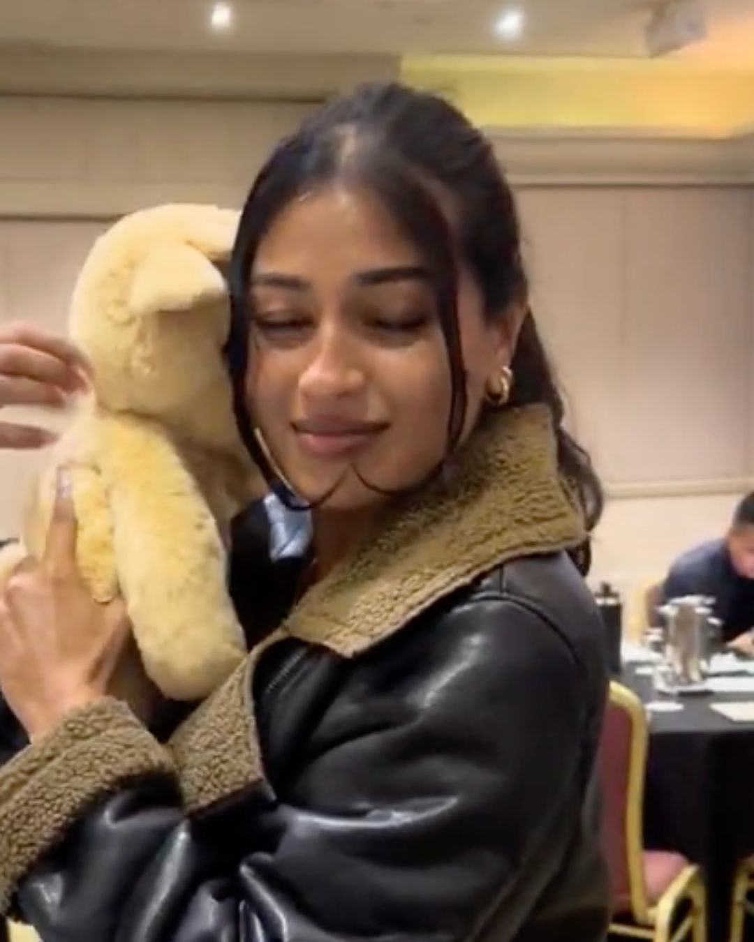 A Cuddle Club customer with their Cuddle Pal
